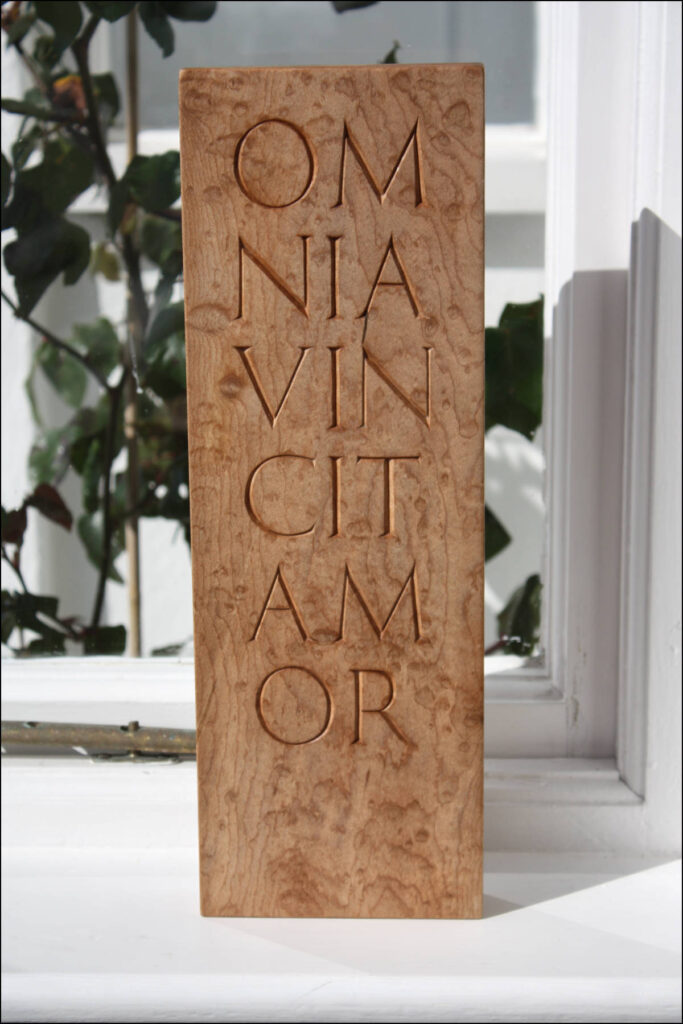 Omnia Vincit Amor Letter Carving