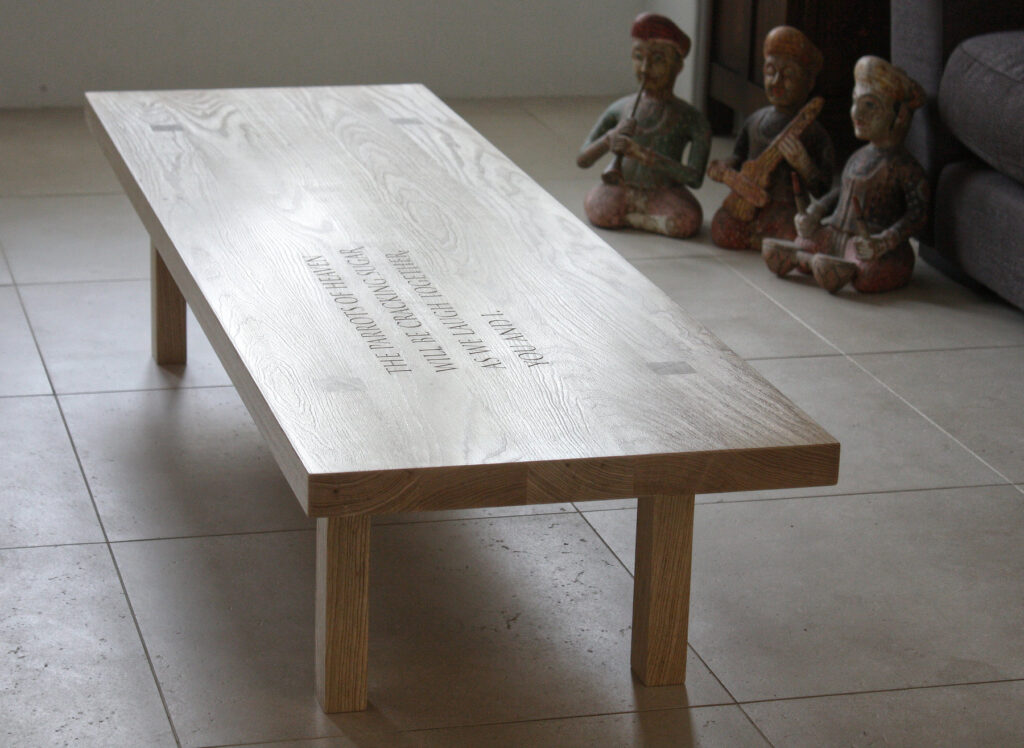 Rumi carved oak table